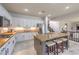 Bright kitchen with granite countertops, stainless steel appliances, and a spacious center island at 2749 Carolina Blue Ave, Henderson, NV 89052