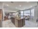 Modern kitchen featuring an island, breakfast nook, and open access to the living room at 2749 Carolina Blue Ave, Henderson, NV 89052