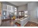 Bright, open living space with hardwood floors, soaring ceilings, and a stylish bar area at 2749 Carolina Blue Ave, Henderson, NV 89052