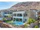 Aerial view of the property with pool, patio, and mountain views at 286 Shaded Canyon Dr, Henderson, NV 89012