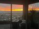 Balcony view featuring a cityscape and mountains, perfect for enjoying the sunset at 286 Shaded Canyon Dr, Henderson, NV 89012