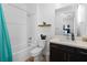 Clean bathroom featuring a shower-tub combo, modern vanity, and essential fixtures at 286 Shaded Canyon Dr, Henderson, NV 89012