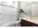 Clean bathroom featuring a glass-enclosed shower, stylish vanity, and modern fixtures at 286 Shaded Canyon Dr, Henderson, NV 89012