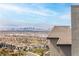 Scenic city view showcasing mountains and a residential area under a partly cloudy sky at 286 Shaded Canyon Dr, Henderson, NV 89012