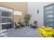 Private courtyard with slate pavers, seating area, potted plant and mountain views at 286 Shaded Canyon Dr, Henderson, NV 89012