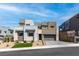 Contemporary two-story home with modern landscaping and a paved driveway at 286 Shaded Canyon Dr, Henderson, NV 89012