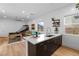 Bright open floorplan with kitchen bar, stainless sink, and space for entertaining guests at 286 Shaded Canyon Dr, Henderson, NV 89012