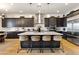 The expansive kitchen showcases a large island, custom cabinets, and stainless steel appliances at 286 Shaded Canyon Dr, Henderson, NV 89012