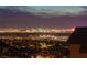 Stunning night view of the Las Vegas city skyline, mountains, and glowing lights from homes at 286 Shaded Canyon Dr, Henderson, NV 89012