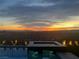 Relaxing pool and spa area with city views at sunset at 286 Shaded Canyon Dr, Henderson, NV 89012