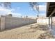 View of the backyard with block wall and storage unit at 3017 Jamestown Way, Las Vegas, NV 89102
