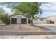 Charming single-story home featuring a well-maintained yard and a covered front porch entrance at 3017 Jamestown Way, Las Vegas, NV 89102
