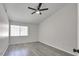 Empty bedroom features ceiling fan, and bright window light at 3404 Winterhaven St # 204, Las Vegas, NV 89108