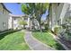A tranquil exterior view with a winding sidewalk and well-maintained landscaping at 3404 Winterhaven St # 204, Las Vegas, NV 89108