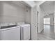 Laundry room with washer and dryer; hallway to living space at 3404 Winterhaven St # 204, Las Vegas, NV 89108