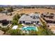 Expansive backyard, with pool and spa, complete with outdoor kitchen and lounge area, perfect for entertaining at 3458 W Agate Ave, Las Vegas, NV 89139
