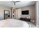 Contemporary bedroom showcasing neutral tones, recessed lighting, and sleek furnishings at 3458 W Agate Ave, Las Vegas, NV 89139