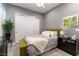 Comfortable bedroom featuring a built-in closet and neutral color palette at 3458 W Agate Ave, Las Vegas, NV 89139