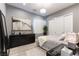 Serene bedroom with elegant furnishings, soft lighting, and ample closet space at 3458 W Agate Ave, Las Vegas, NV 89139