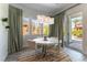 Cozy breakfast nook with bright windows and backyard views at 3458 W Agate Ave, Las Vegas, NV 89139