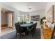 Elegant dining room with poker table, stylish lighting, and modern artwork at 3458 W Agate Ave, Las Vegas, NV 89139
