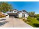 Beautiful two-story home with a well-manicured lawn and an attached two-car garage at 3458 W Agate Ave, Las Vegas, NV 89139