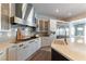 Elegant kitchen featuring white cabinetry, stainless steel appliances, and a functional layout at 3458 W Agate Ave, Las Vegas, NV 89139