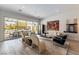 Comfortable living room with a seamless transition to the outdoor pool and patio area at 3458 W Agate Ave, Las Vegas, NV 89139