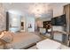 The main bedroom includes a walk-in closet and a wall-mounted television for your comfort at 3458 W Agate Ave, Las Vegas, NV 89139