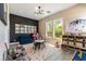 Bright playroom with natural light, star rug, fun decor, and space for learning and creative play at 3458 W Agate Ave, Las Vegas, NV 89139