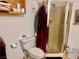 Bathroom featuring a shower and standard toilet, needing some TLC at 3491 S Bridle Way, Crystal, NV 89020