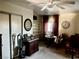 Cozy bedroom with ample storage and a quaint sitting area near the window at 3491 S Bridle Way, Crystal, NV 89020