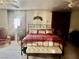 Comfortable bedroom featuring a plush bed and soft lighting from the window at 3491 S Bridle Way, Crystal, NV 89020