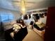 Bedroom featuring a bed, small window, and closet with clothing racks at 3491 S Bridle Way, Crystal, NV 89020