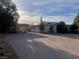 Spacious single story home with covered parking and a large gravel driveway at 3491 S Bridle Way, Crystal, NV 89020
