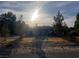 Single story home in desert community with desert landscaping and gravel driveway at 3491 S Bridle Way, Crystal, NV 89020