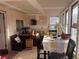 Sunroom dining area with breakfast bar and large windows with natural light at 3491 S Bridle Way, Crystal, NV 89020