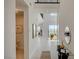 Bright hallway leading to an open living space, featuring modern decor and great natural lighting at 350 Gandara St, Las Vegas, NV 89138