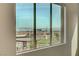 View from a large window showing nearby homes and scenic mountains at 350 Gandara St, Las Vegas, NV 89138