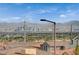 Scenic view of the Las Vegas skyline over rooftops and neighborhood landscaping at 350 Gandara St, Las Vegas, NV 89138