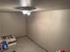A basement area showcasing flooring, lighting, and ample storage space at 355 Gracious Way, Henderson, NV 89011