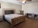 Serene bedroom featuring a unique bed frame with 'Sweet Dreams' and 'Serenity' inscriptions at 355 Gracious Way, Henderson, NV 89011