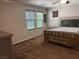 Bright bedroom with a decorative headboard, carpet, and natural light at 355 Gracious Way, Henderson, NV 89011