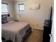 Bedroom featuring a comfortable Queen bed and flat screen TV at 355 Gracious Way, Henderson, NV 89011