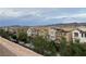 A view of an attractive residential area featuring homes with varied architectural styles and landscaping at 355 Gracious Way, Henderson, NV 89011