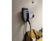 Garage EV charging station for electric vehicle charging with a box of supplies at 355 Gracious Way, Henderson, NV 89011