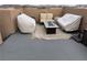 Inviting rooftop deck featuring comfortable seating around a modern fire pit at 355 Gracious Way, Henderson, NV 89011