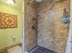 Bathroom shower with tiled walls and a hand-held shower head, with a tile floor at 438 Las Casitas Way, Las Vegas, NV 89121