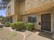 Exterior view of a multi-Gathering unit with low maintenance landscaping at 438 Las Casitas Way, Las Vegas, NV 89121