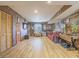 Spacious living room with hardwood floors, cozy seating, and decorative accents at 438 Las Casitas Way, Las Vegas, NV 89121
